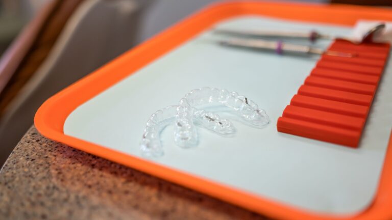 Clear Aligners vs. Braces: What Adults Need to Know Before Choosing